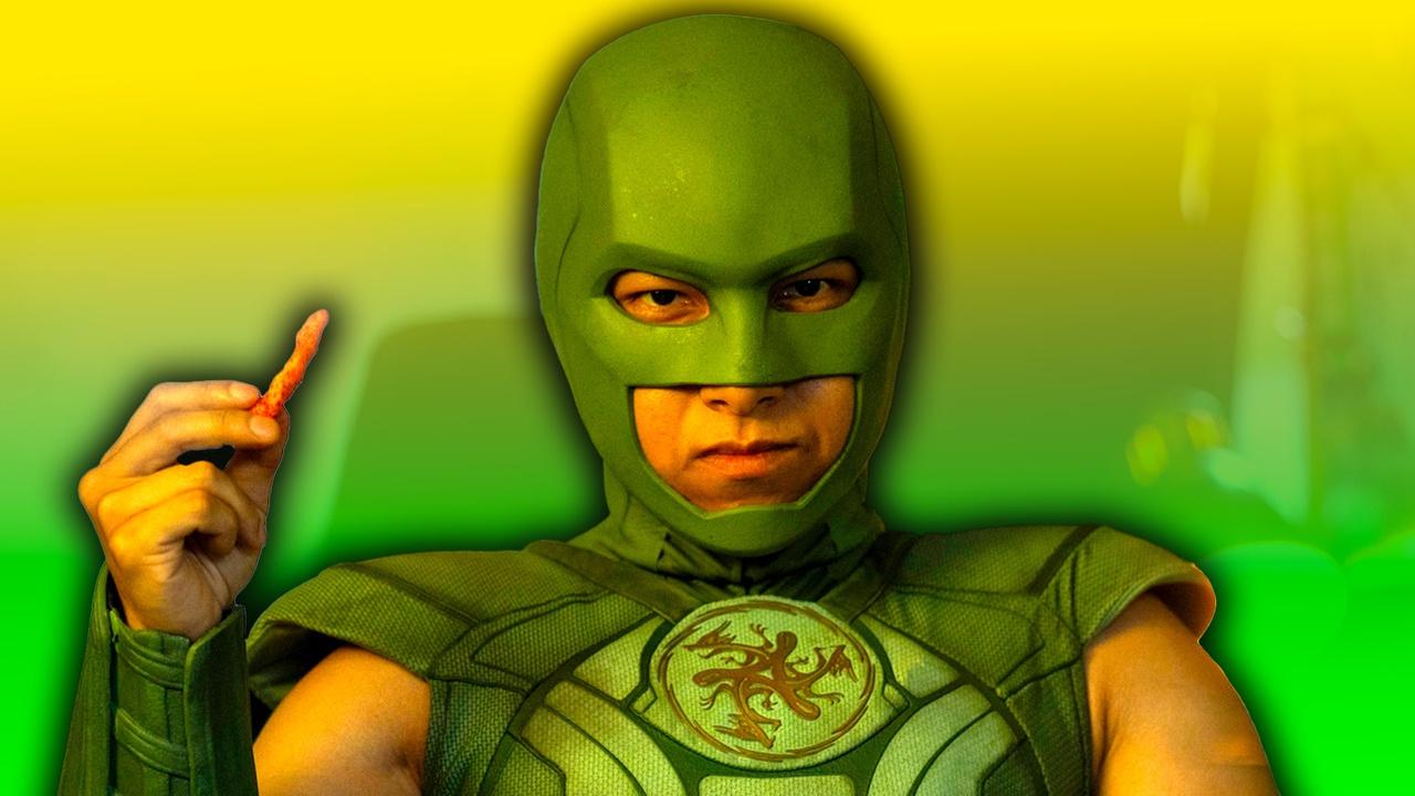 Nhut Le in Peacemaker on yellow and green background.
