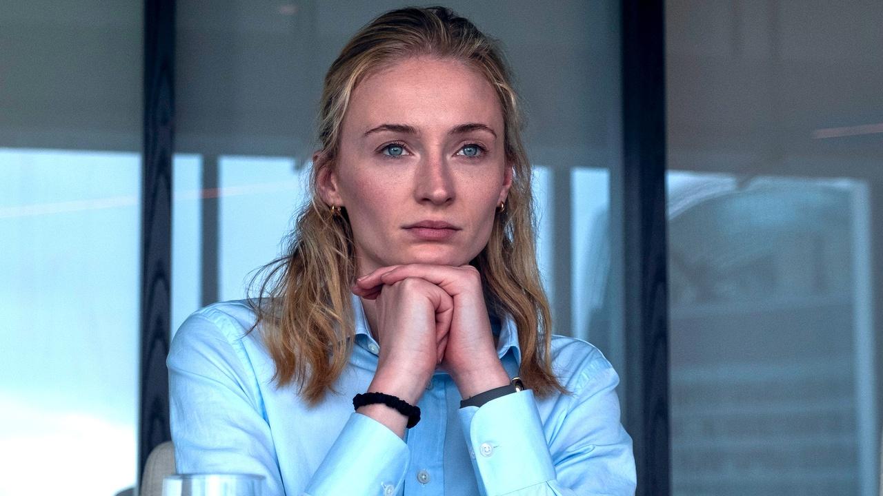 Sophie Turner in Steal looking out on a balcony