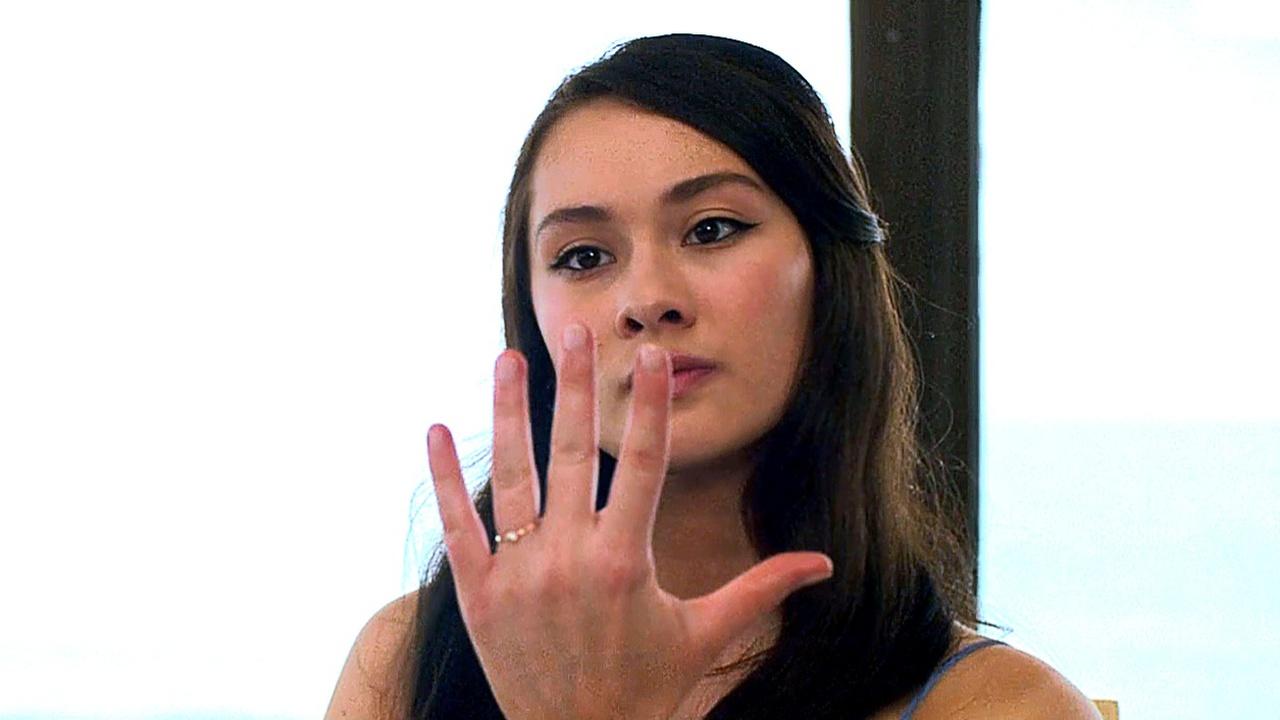 Lola Tung as Belly Conklin showing off her engagement ring in Summer I Turned Pretty