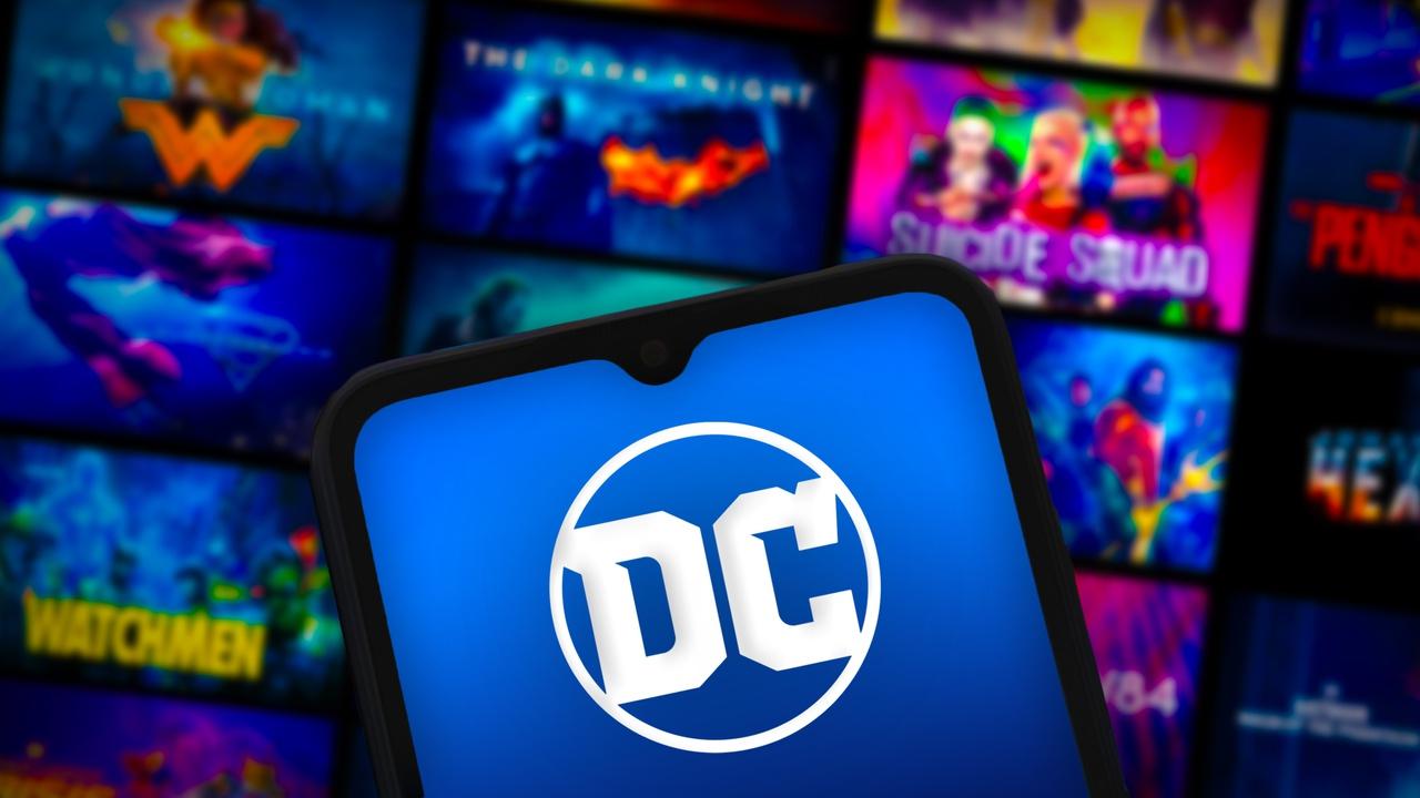 DC logo, DC movies and shows in background