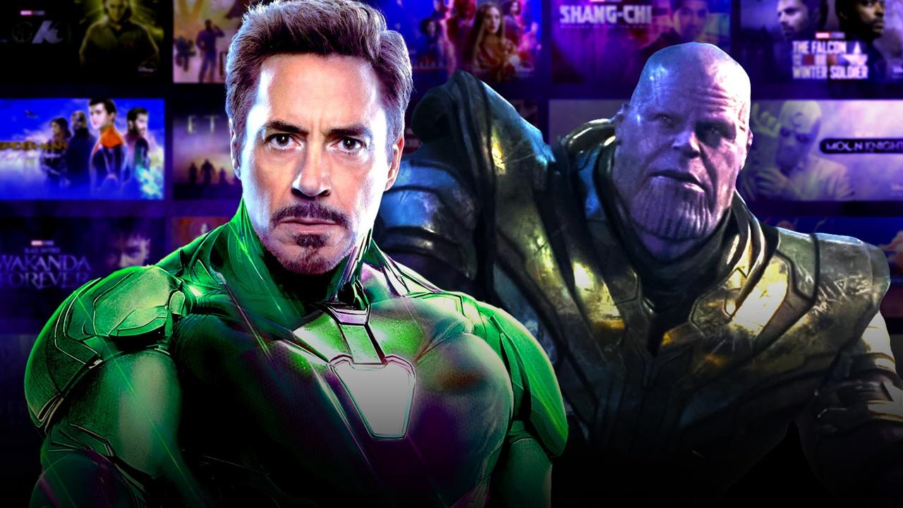 Robert Downey Jr. as Iron Man alongside Thanos.