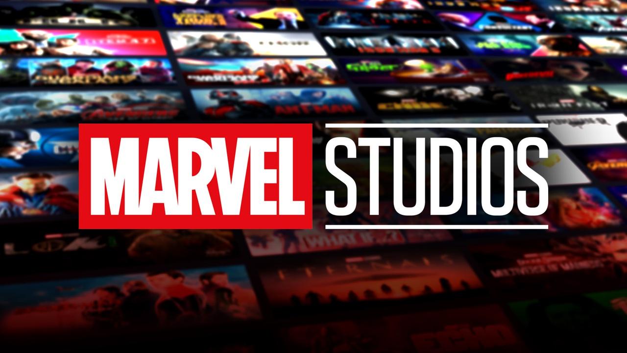 Marvel Studios logo, MCU movies and shows blurred in background