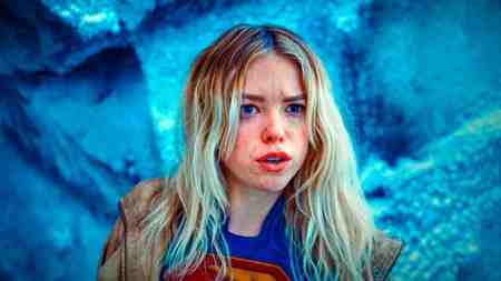 Supergirl, played by Milly Alcock
