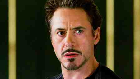 Marvel Studios' MCU Tony Stark looking at villain