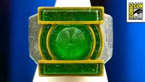Green Lantern ring from Lanterns, San Diego Comic-Con logo in top right corner.