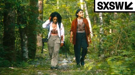 Two characters walking in a forest in A Safe Distance; SXSW logo.