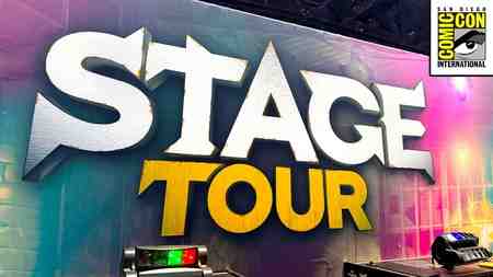 Stage Tour booth at San Diego Comic-Con with Comic-Con logo in the top right corner.