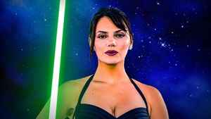 Dafne Keen Star Wars wallpaper with lightsaber