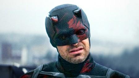 Daredevil, played by Charlie Cox, in black costume and helmet in Daredevil: Born Again Season 2
