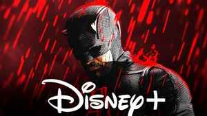 Matt Murdock in the black Daredevil costume standing in the rain in Daredevil; Disney+ logo.