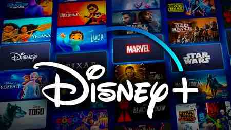 Disney Plus logo, movie and show tiles in background