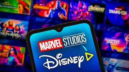 Marvel Studios and Disney Plus logos and tiles on Disney plus app