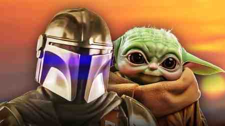 The Mandalorian and Grogu in front of a sunset.