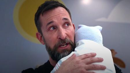 Dr. Robby holding Jane Doe.