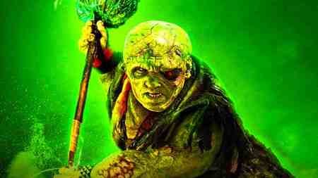 The Toxic Avenger against a green background.
