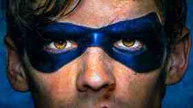 A close-up of live-action Robin's face.