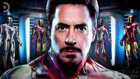 Iron Man in front of suit collection