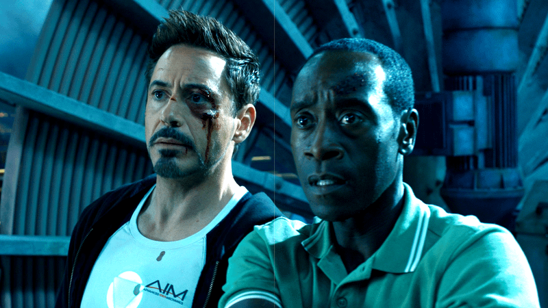 Robert Downey Jr. as Tony Stark and Don Cheadle as James Rhodes in Iron Man 3