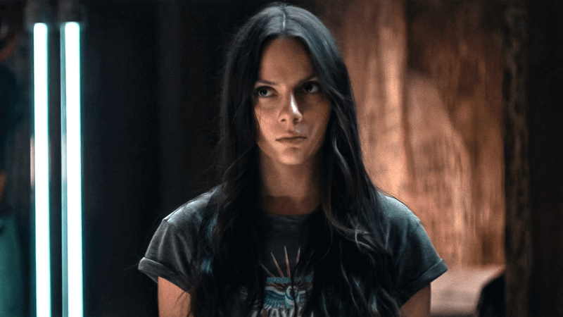 Dafne Keen as X-23 in Deadpool & Wolverine in T-shirt and resistance hideout.