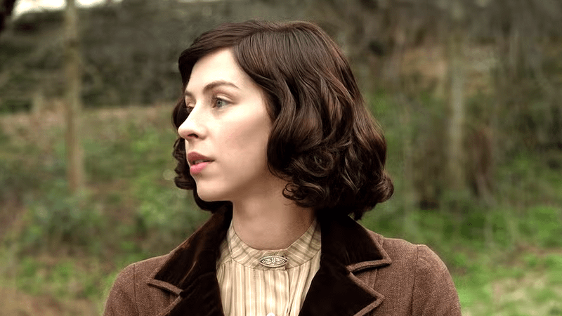 Hermione Corfield as Julia Moriston looking over her shoulder in Outlander: Blood of my Blood