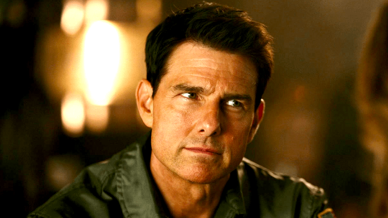Tom Cruise as Maverick sitting in a bar in Top Gun: Maverick