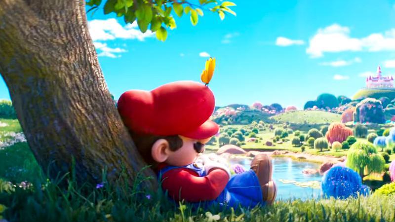 Mario leaning on a tree and napping in The Super Mario Galaxy Movie