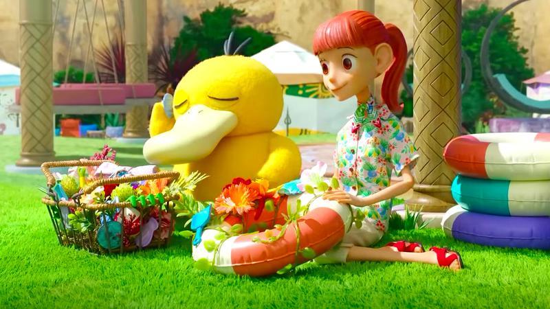 Haru sitting next to a Psyduck in Pokemon Concierge