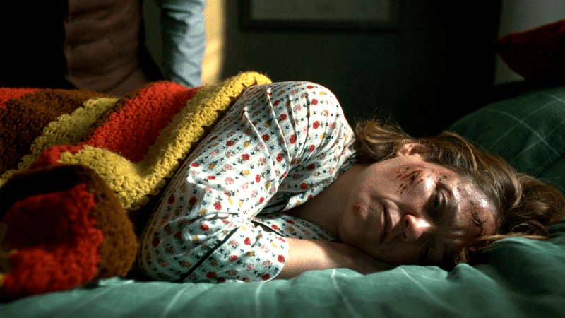 Erika Christensen as Angie Polaski lying down in Will Trent Season 4.