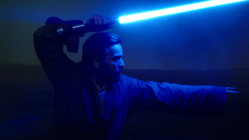 Obi Wan Kenobi wielding blue lightsaber in Disney+ series.