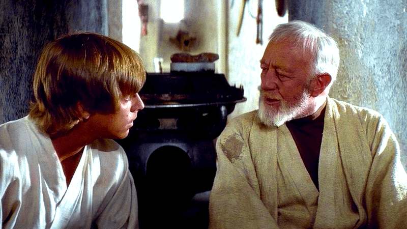 Luke Skywalker and Obi_wan Kenobi looking into each other's eyes in Star Wars: A New Hope