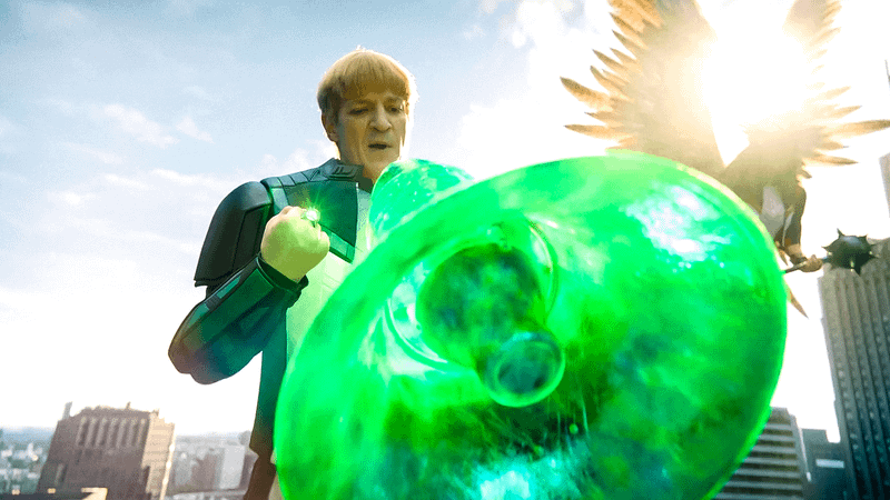 Guy Gardner constructs a microphone.