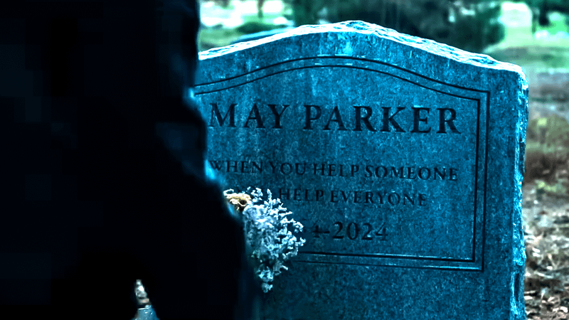 Peter Parker visiting Aunt May's grave.