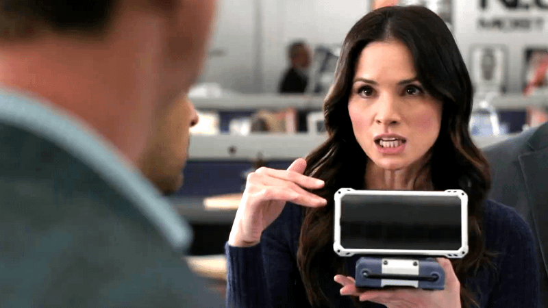 Jessica Knight holding a new AI team member of the NCIS team in NCIS Season 23, Episode 8