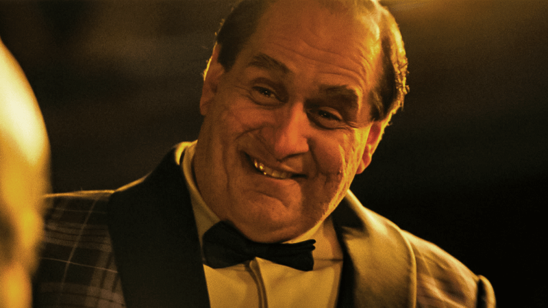 Collin Farrell as Penguin smiling in The Batman.