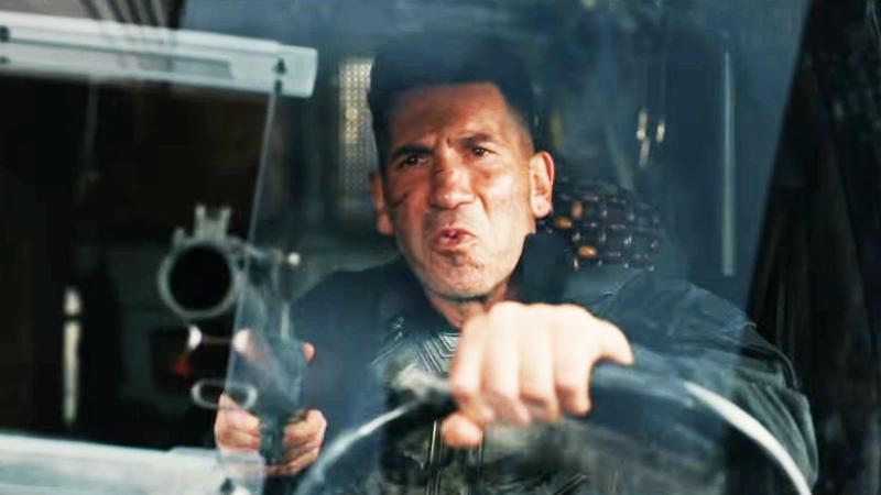 Jon Bernthal as Punisher in van with gun in Spider-Man Brand new Day trailer.