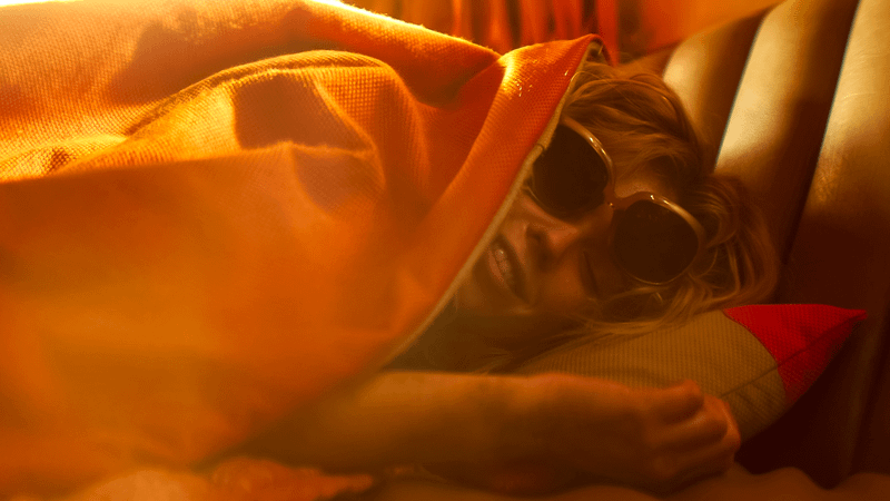 Supergirl waking up drunk on a red son planet.