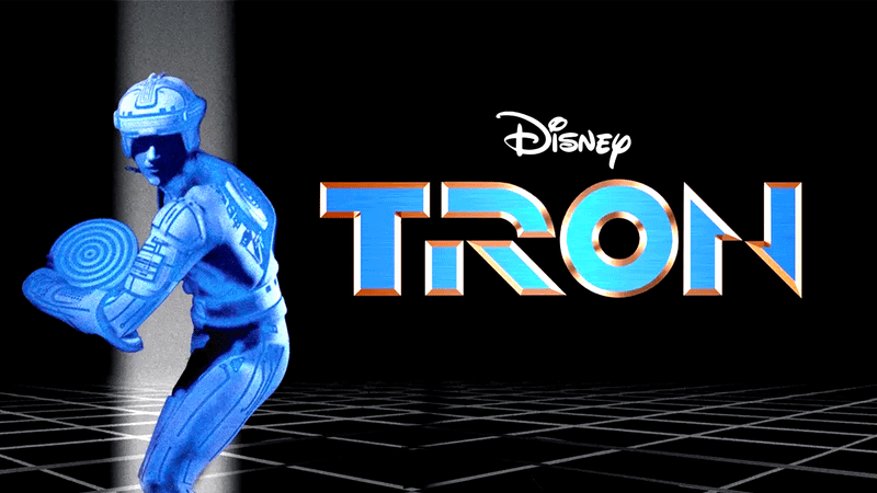 The Tron poster featuring Flynn flinging a digital disc