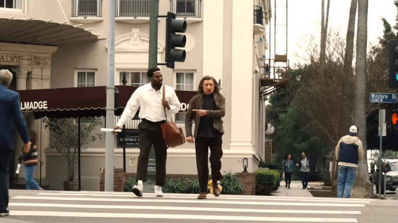 Yahya Abdul-Mateen II as Simon Williams and Ben Kingsley as Trevor Slattery in Wonder Man