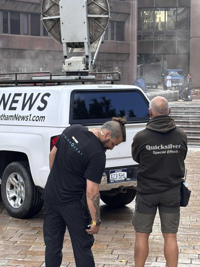 Clayface set with Gotham News van and crew member wearing a vision quest shirt