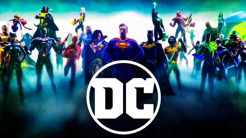DC logo with heroes behind it
