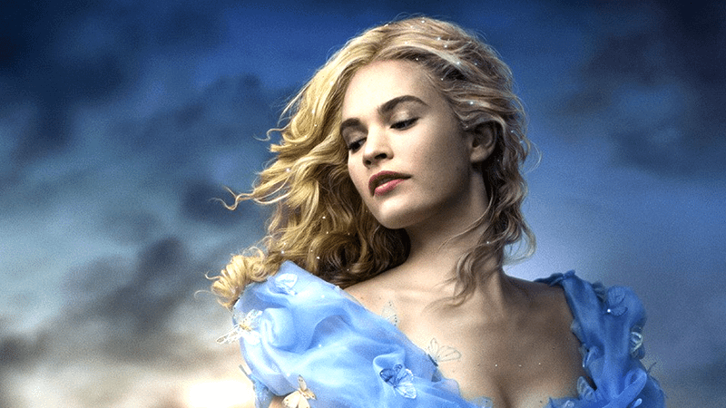Lily James as Cinderella with her hair blowing in the wind in Cinderella