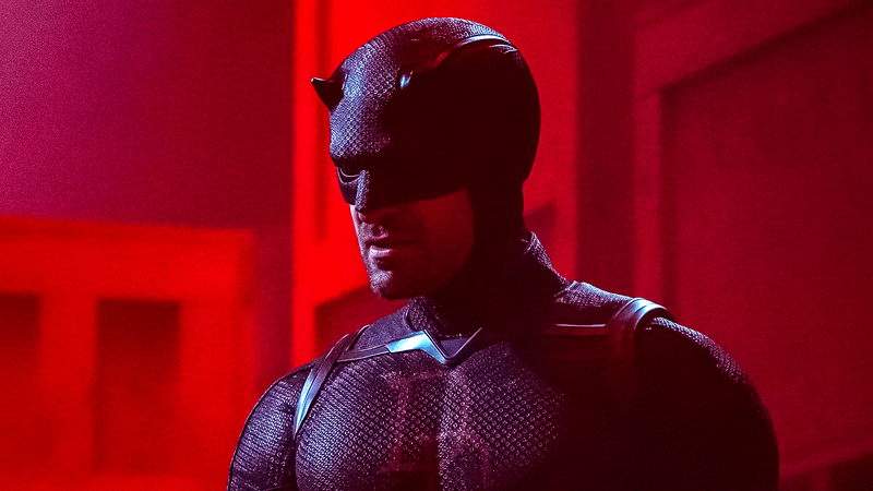 Charlie Cox as Matt Murdock standing in a red light in Daredevil: Born Again