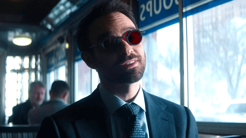 Charlie Cox as Matt Murdock sitting in a diner in Daredevil: Born Again