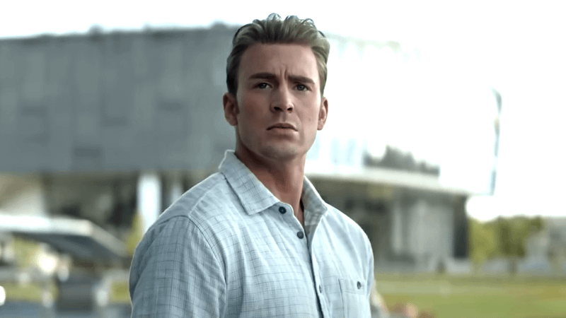 Chris Evans as Steve Rogers looking at something in Avengers: Endgame.
