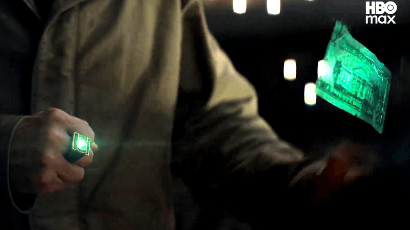 Hal Jordan using his ring constructs to create fake money in Lanterns.