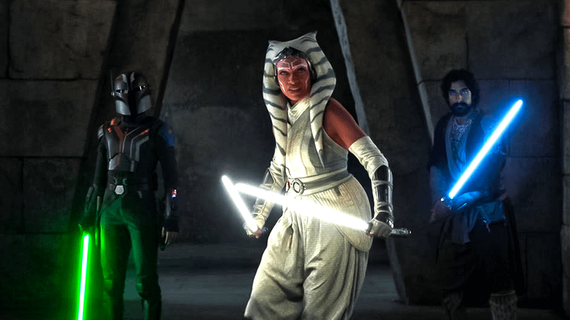 Ahsoka, Ezra and Sabine wielding lightsabers.