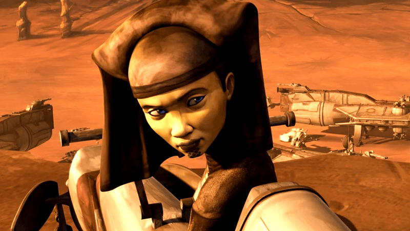 Luminara Unduli looking over her shoulder on a speeder in Star Wars: The Clone Wars
