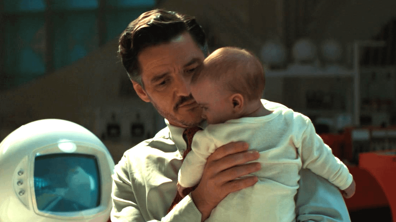 Pedro Pascal as Reed Richards with Franklin in The Fantastic Four: First Steps.