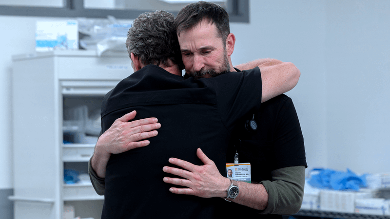 Dr. Abbott hugging Dr. Robby in The Pitt Season 2 finale.