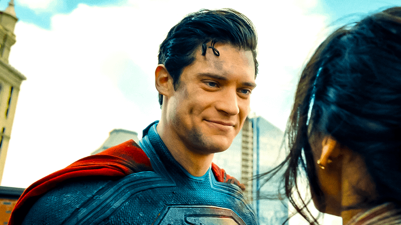 Superman smiling at a civilian in Superman